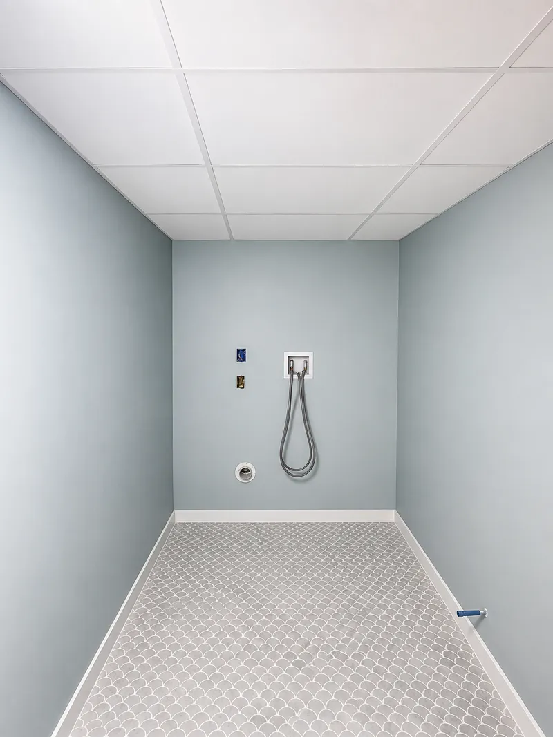 Finished suspended ceiling installation in a residential space by Mass Framing Solutions