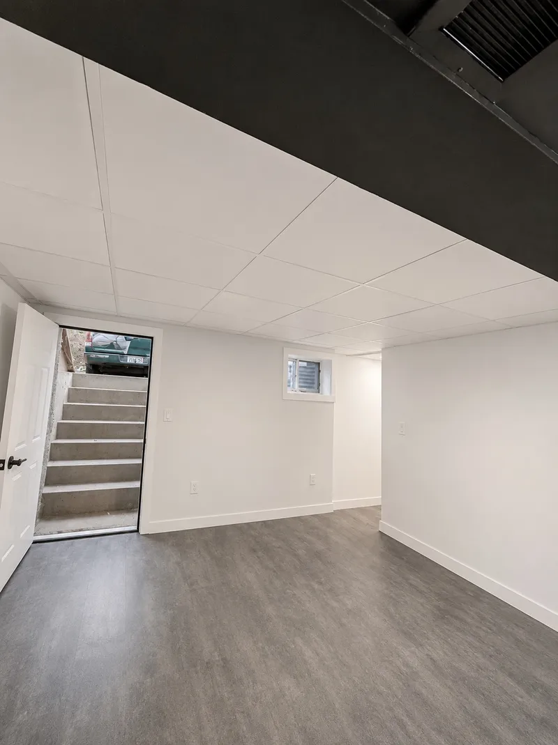 Residential drop ceiling installation by Mass Framing Solutions