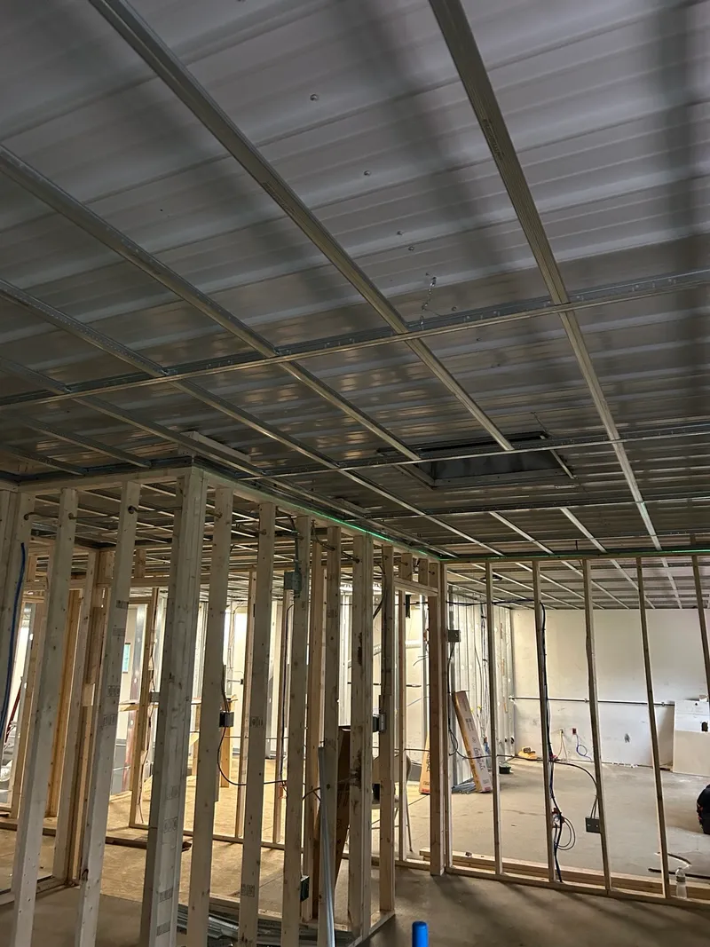Interior drywall grid and wall framing installation by Mass Framing Solutions
