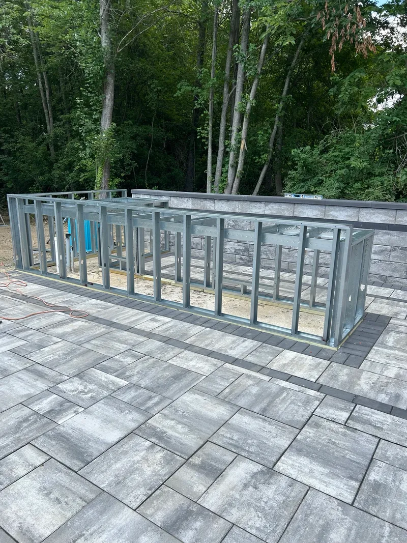 Exterior steel stud framing for an outdoor kitchen, installed by Mass Framing Solutions